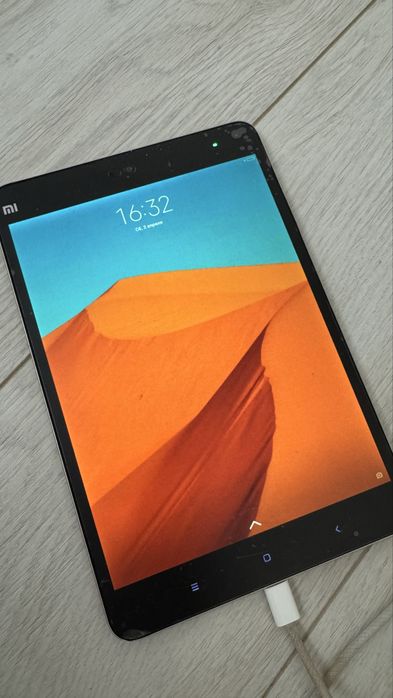 Планшет марка MI…………………………