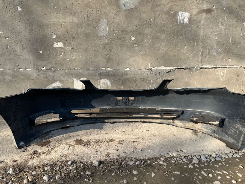 Toyota Corolla E120 Бампер передняя