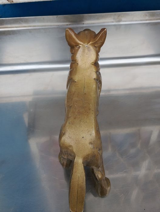 Бронзова статуя Куче