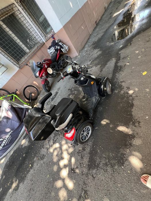 Scuter electruc pentru persoane cu dizabilitați
