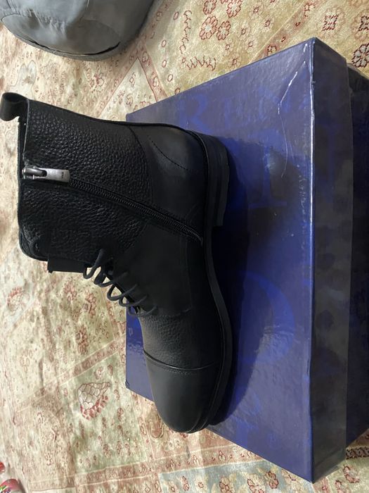 Продам новые мужские сапоги