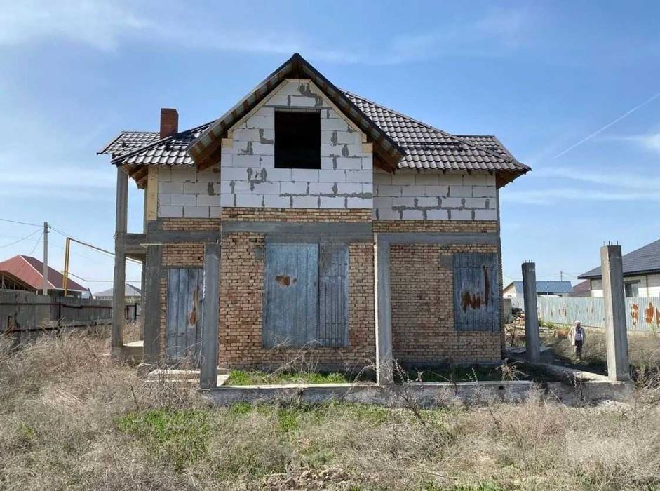 Дом с двумя участками