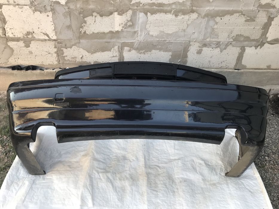 Бампера BMW E38 фары
