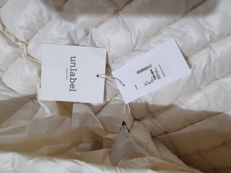 Продам пуховик новый