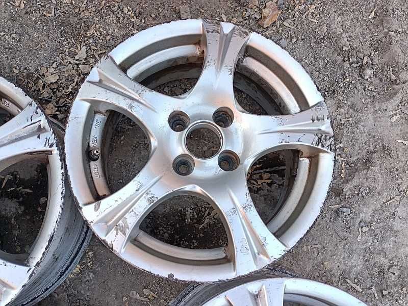Продам оригинальные легкосплавные диски