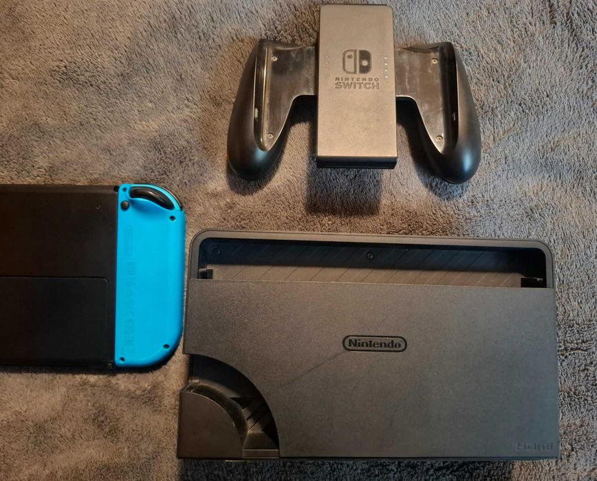 Nintendo Switch OLED Edition (пълен комплект) + допълнителна памет + калъф + акаунт със 7 топ игри