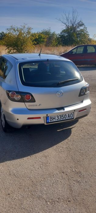 Автомобил Мазда 3