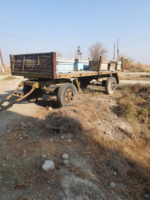 Маз прицеп яхши холатда бортлари хам бор балонлари ковчук