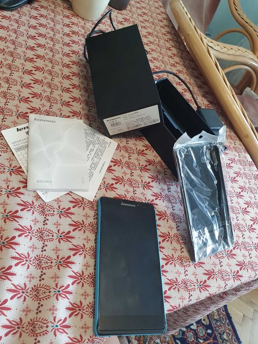 Lenovo K910 със зарядно, калъф, документи