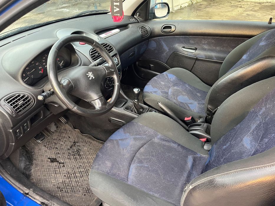 Peugeot  206 1.4 75 коня
