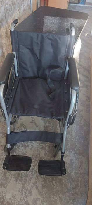 Инвалидное кресло