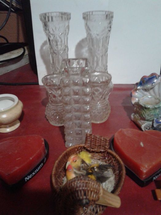 Вази, свещници и  тъкана картина за стена