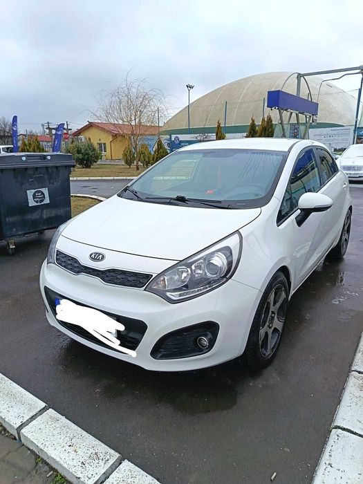 Vind auto KIA Rio an 2012