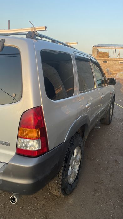 Мазда трибьют 3 литра