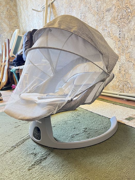 Продается детское кресло - качалка. Шезлонг. Новое не использовалась