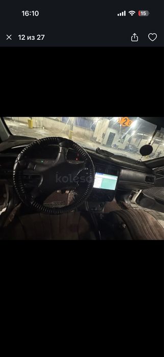 Тайота карина е