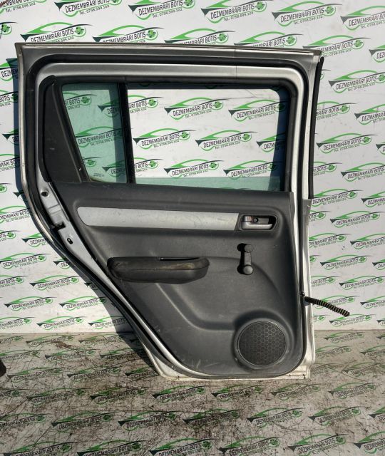 Usa / Portiera spate stanga Defect minor Suzuki Swift a 3-a generatie