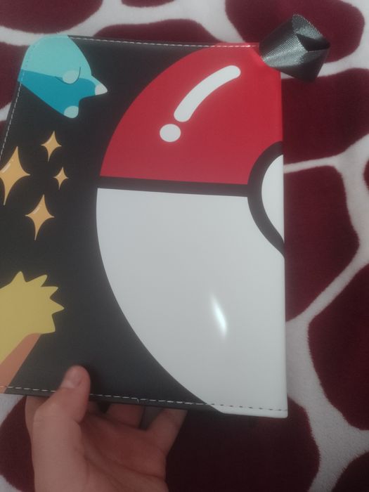 Pokemoni se vinde cu tot cu albumul