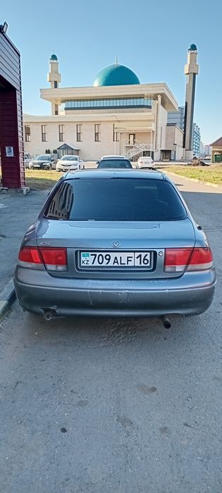 Мазда кронус 92..