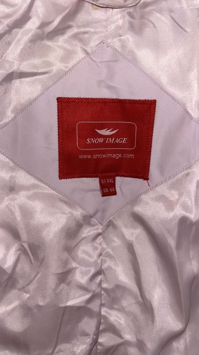 Розовая дутая куртка