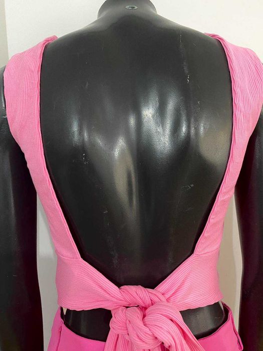 Розов потник с гол гръб