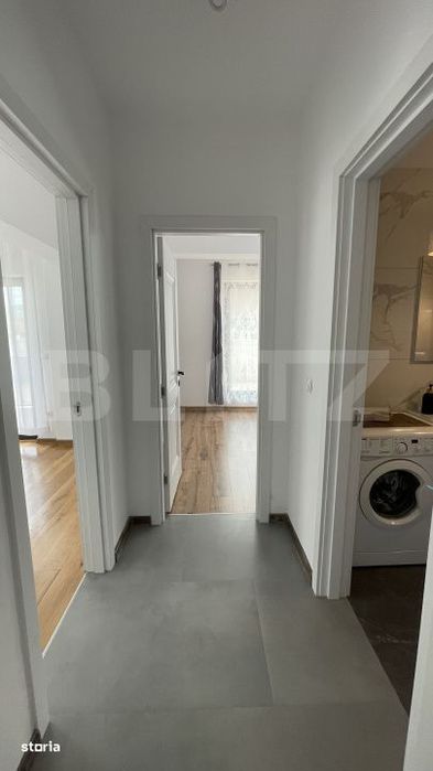 Apartament bloc nou, 72 mp, 2 dormitoare si living, parter, zona Nord