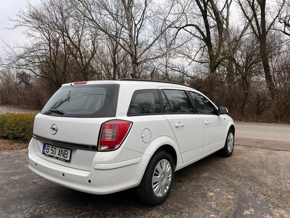 Opel astra h 2013 rulaj doar 100.000 real