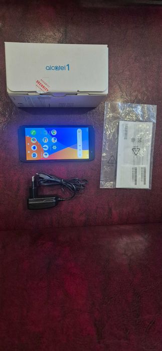 Телефон Alcatel one