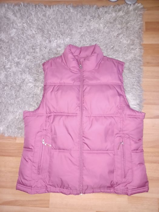 Vestă          .