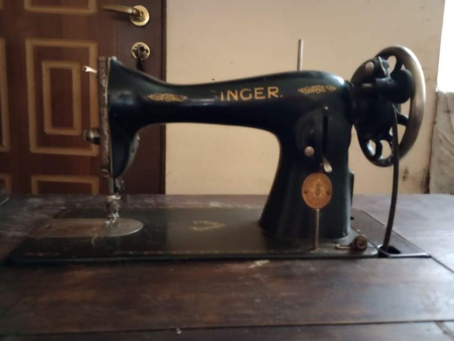 Mașini de cusut Singer