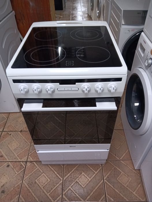 Тясна свободно стояща печка с керамичен плот Gram 2 години гаранция!