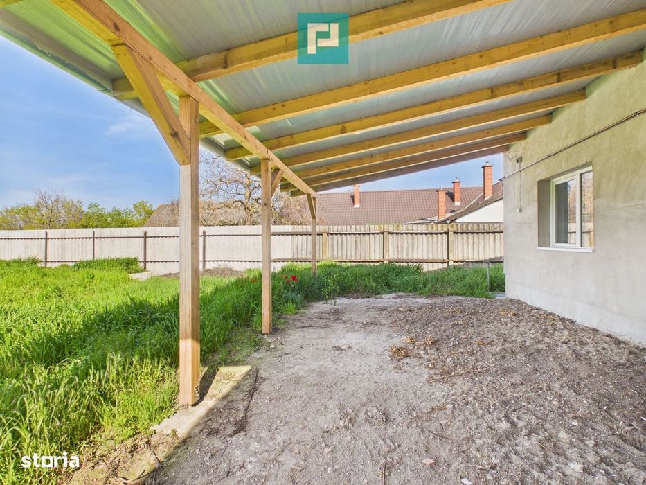 Casă renovată 4 camere si 1452 mp teren în Bătania