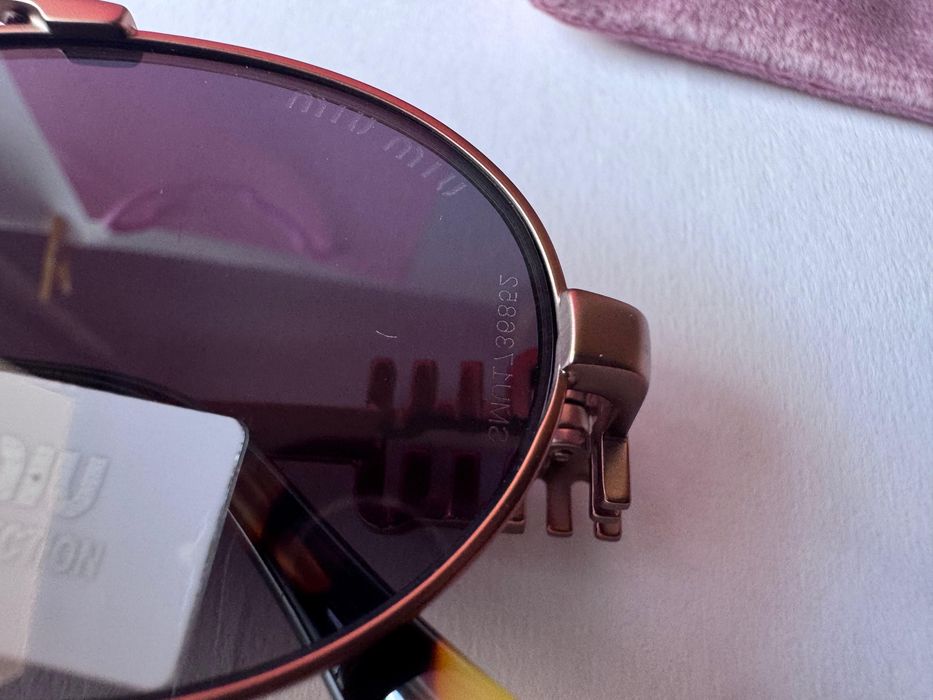 Ochelari de soare Miu Miu SMU 54ZS 53-19 140, Noi