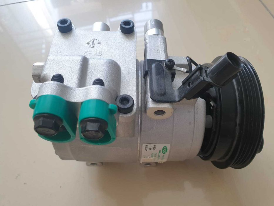 Компрессор кондиционера Hyundai Grand Starex