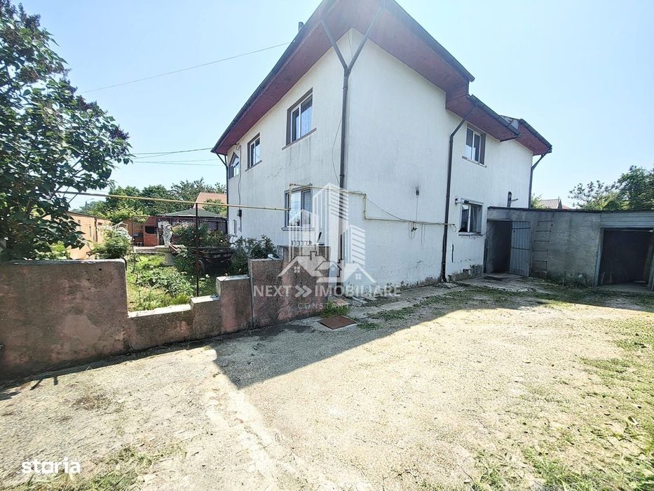 Casă P+1 cu 8 camere 492 mp teren 21 ml deschidere comision 0%