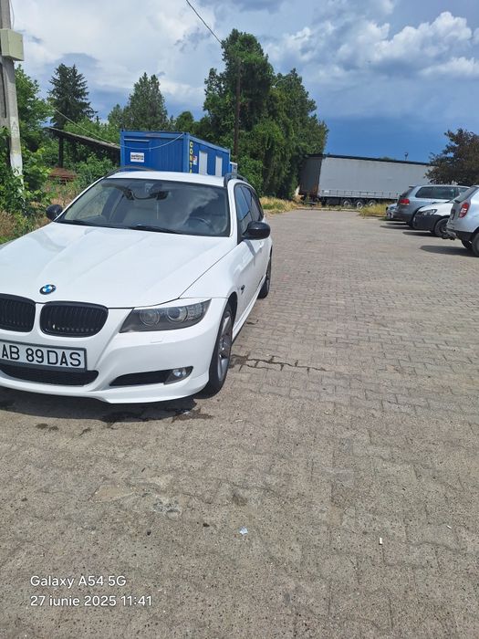 vând BMW e91 x drive