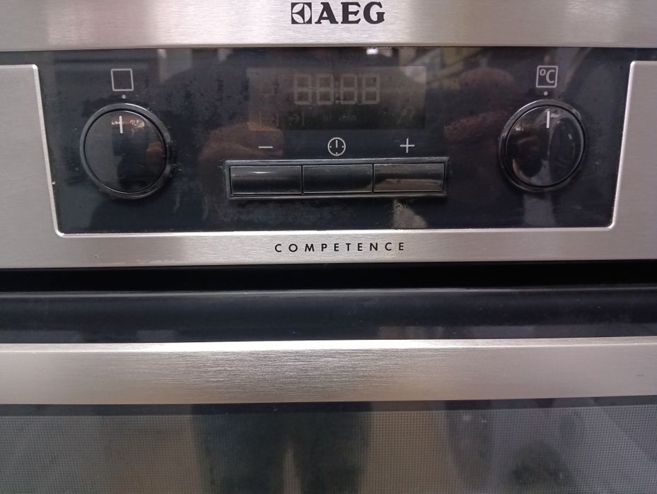 Иноксова печка за вграждане с индукционни котлони Аег Aeg  с Гаранция