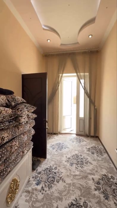 Кибрай туманида ховли учаска сотилади 8 сотих 5 та хона