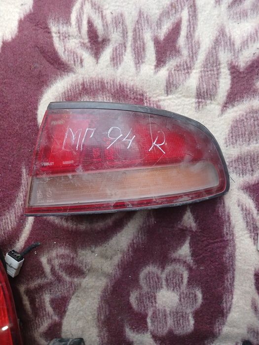 Фонарь Митсубиси Галант 1995г