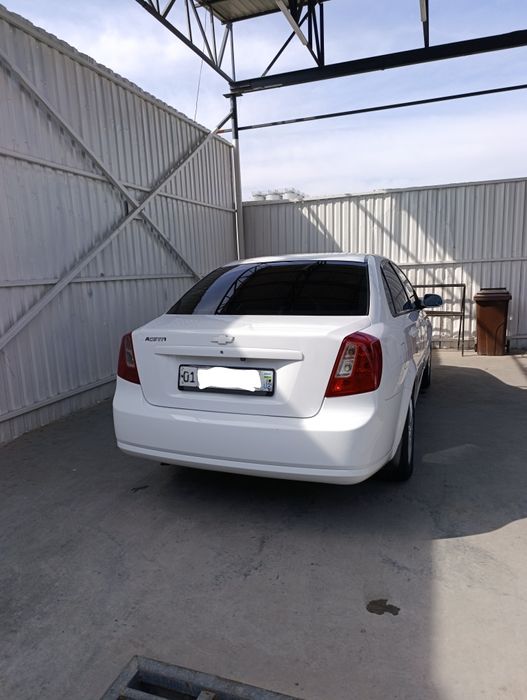 Лаcетти 1.8  3 позиция автомат каробка