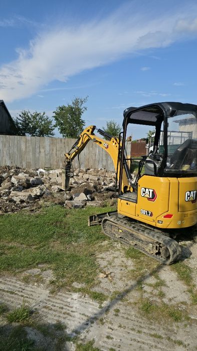 Inchiriez miniexcavator cupe de la 15 cm la 120cm si  cu picon pentru diferite lucrari