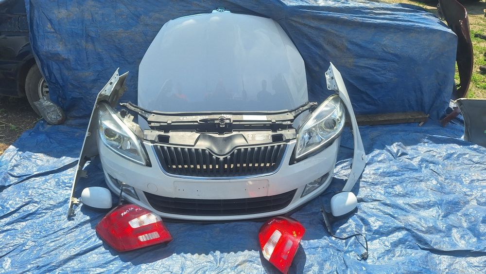 Bara fata capota tragar skoda fabia 2 1.4 tdi  far tripla oglinda aripi