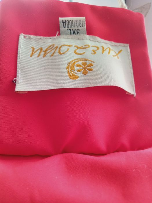 Продам красный пуховик