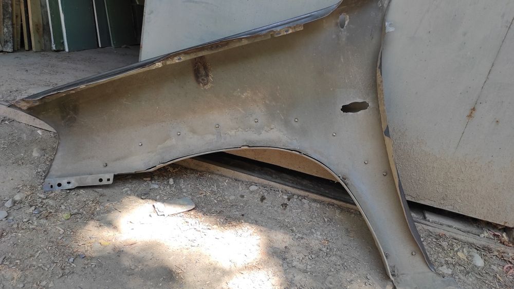 Крыло правое Мазда Трибьют