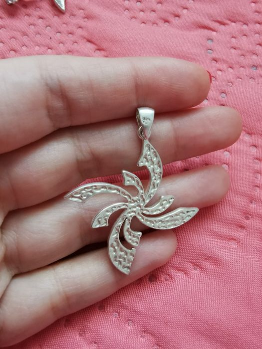 Сребърни гривни, висулки и пръстен