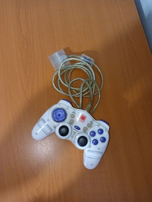 PlayStation 2 Slim + 8 jocuri + manetă