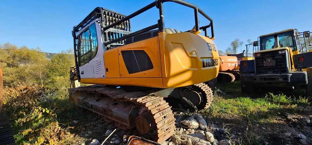 Liebherr R 916 Excavator pe senile