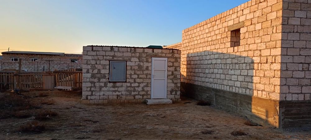 Продам участок с недостроенным домом