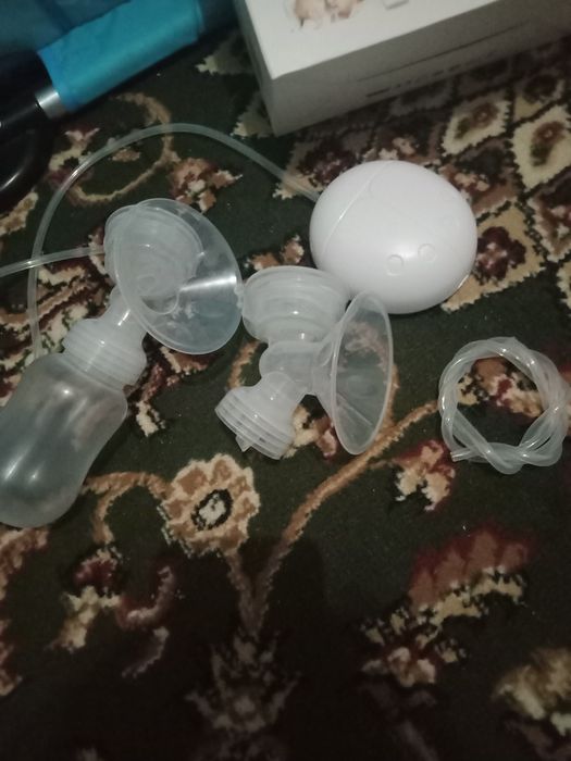 Продам молокоотсос электрический