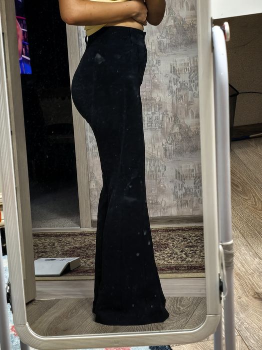 Брюки клёш, черного цвета